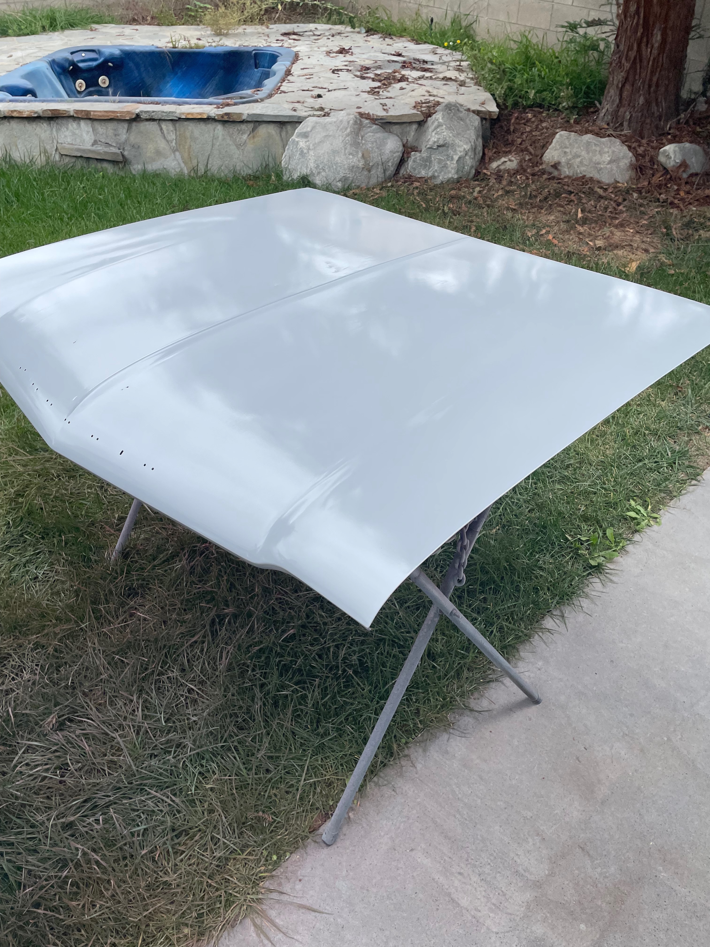 1964 Corvair hood surface preparation during body-paint phase