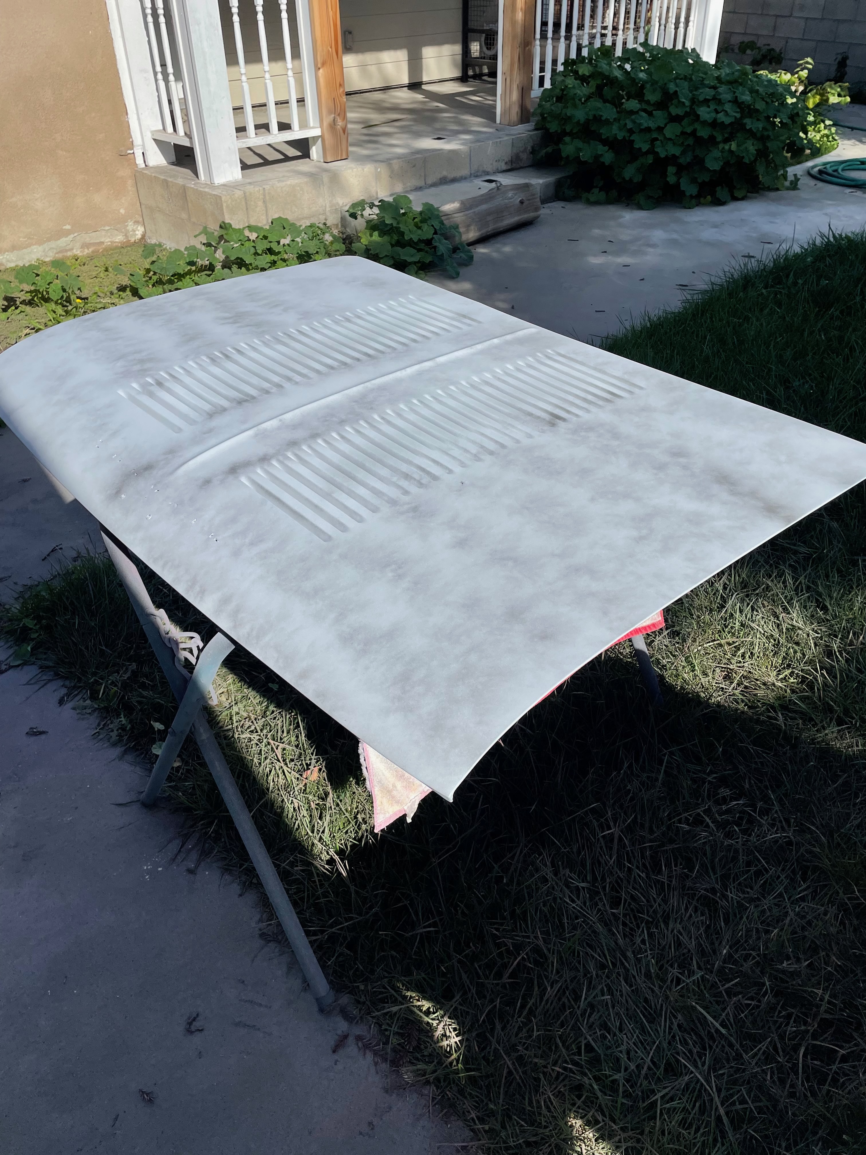 1964 Corvair primer surface finishing during body-paint phase