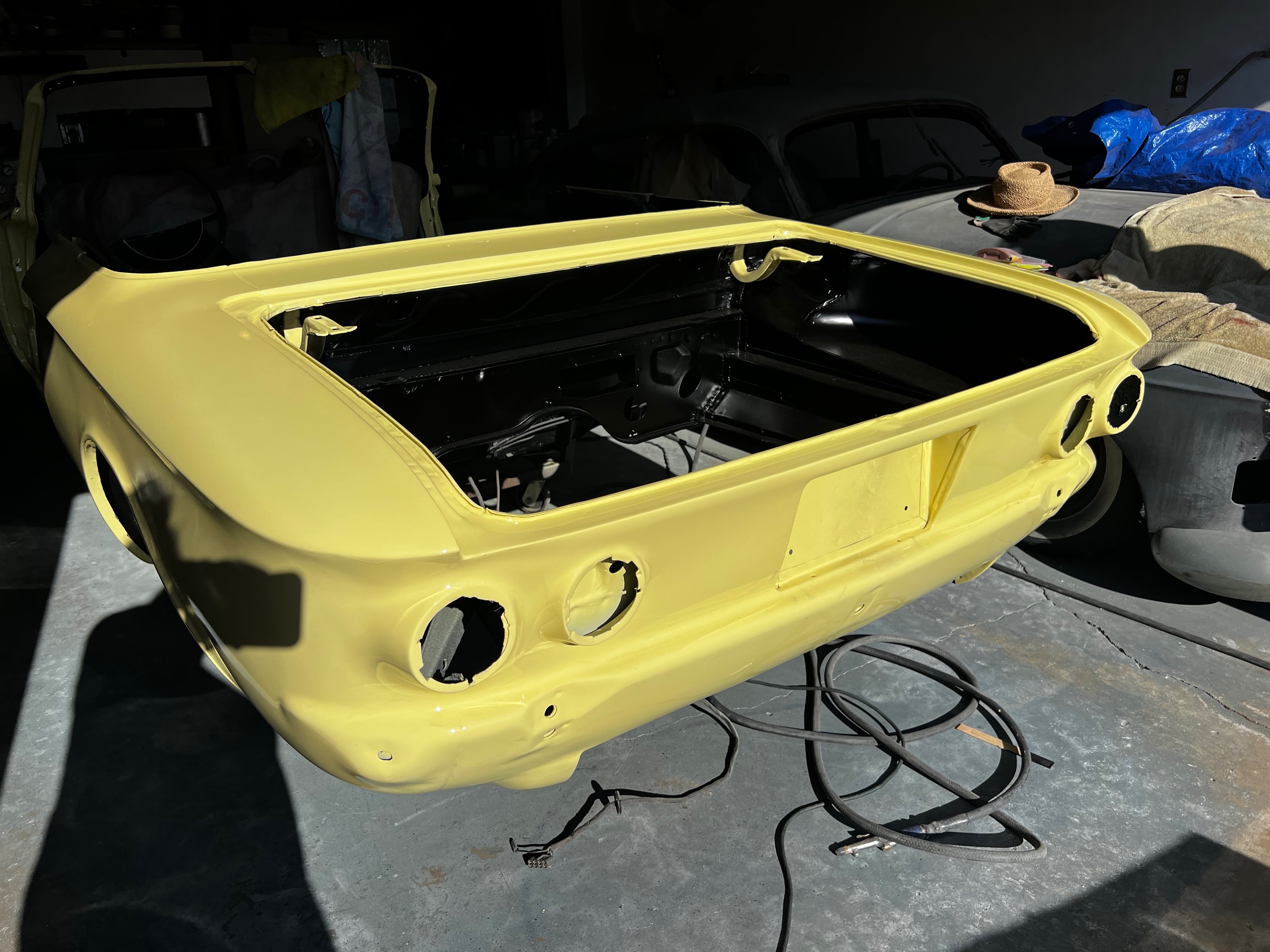 1964 Corvair body finishing touches during body-paint phase