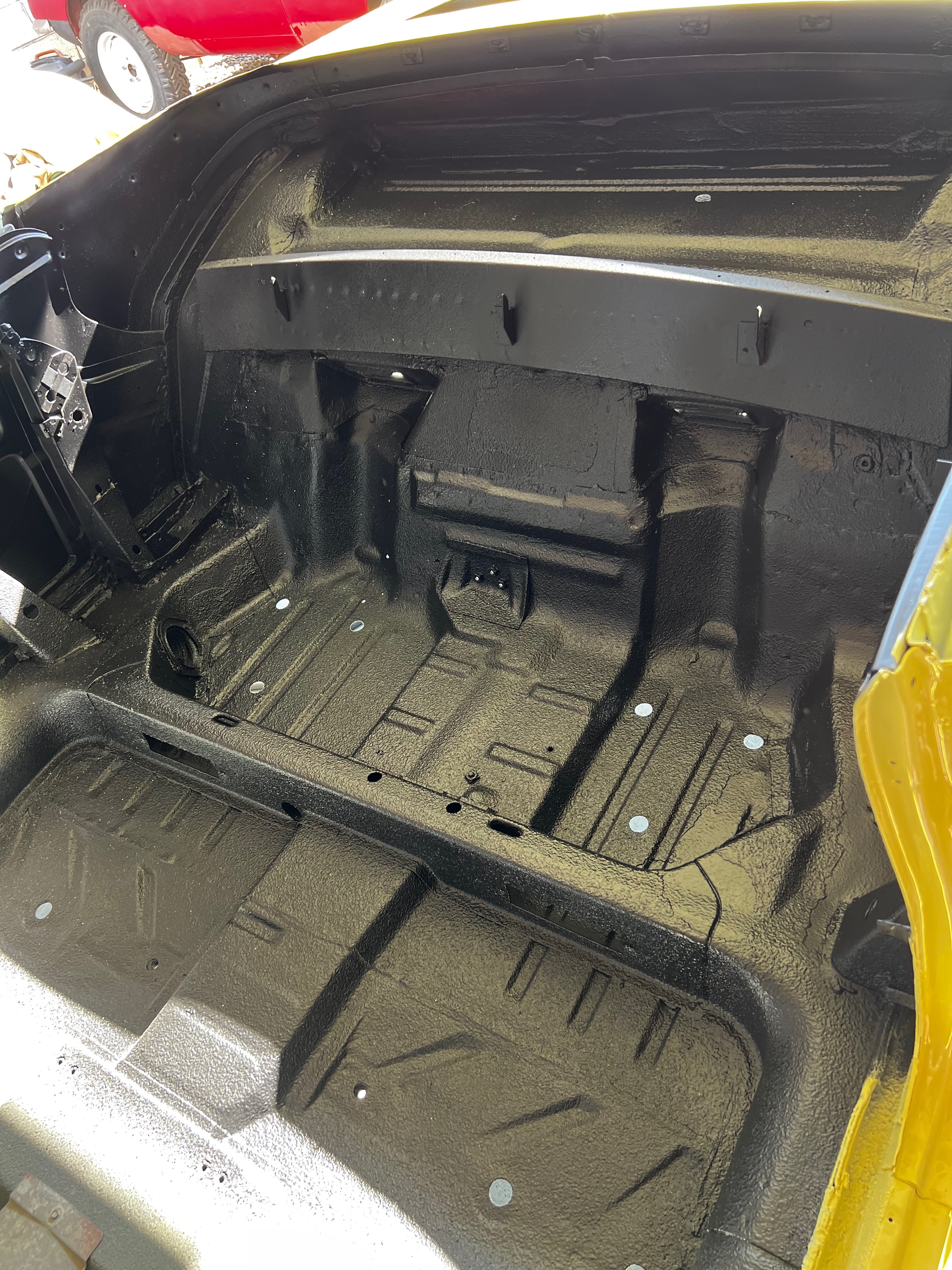 1964 Corvair body panel repair during body-paint phase