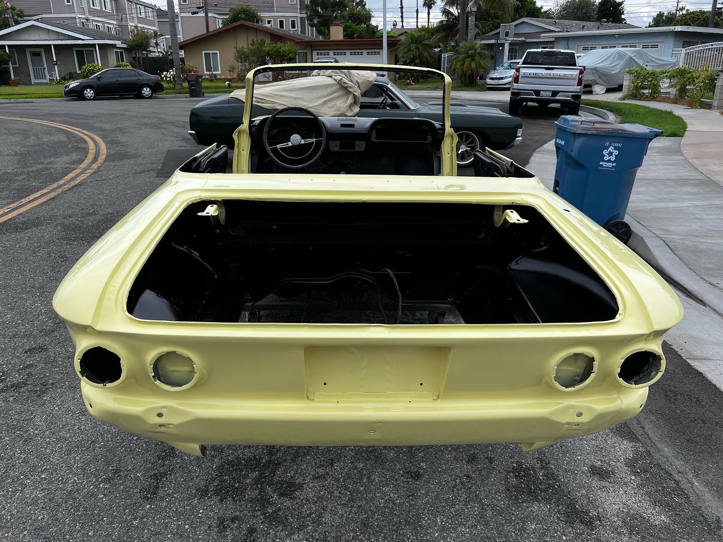 1964 Corvair paint preparation with primer during body-paint phase