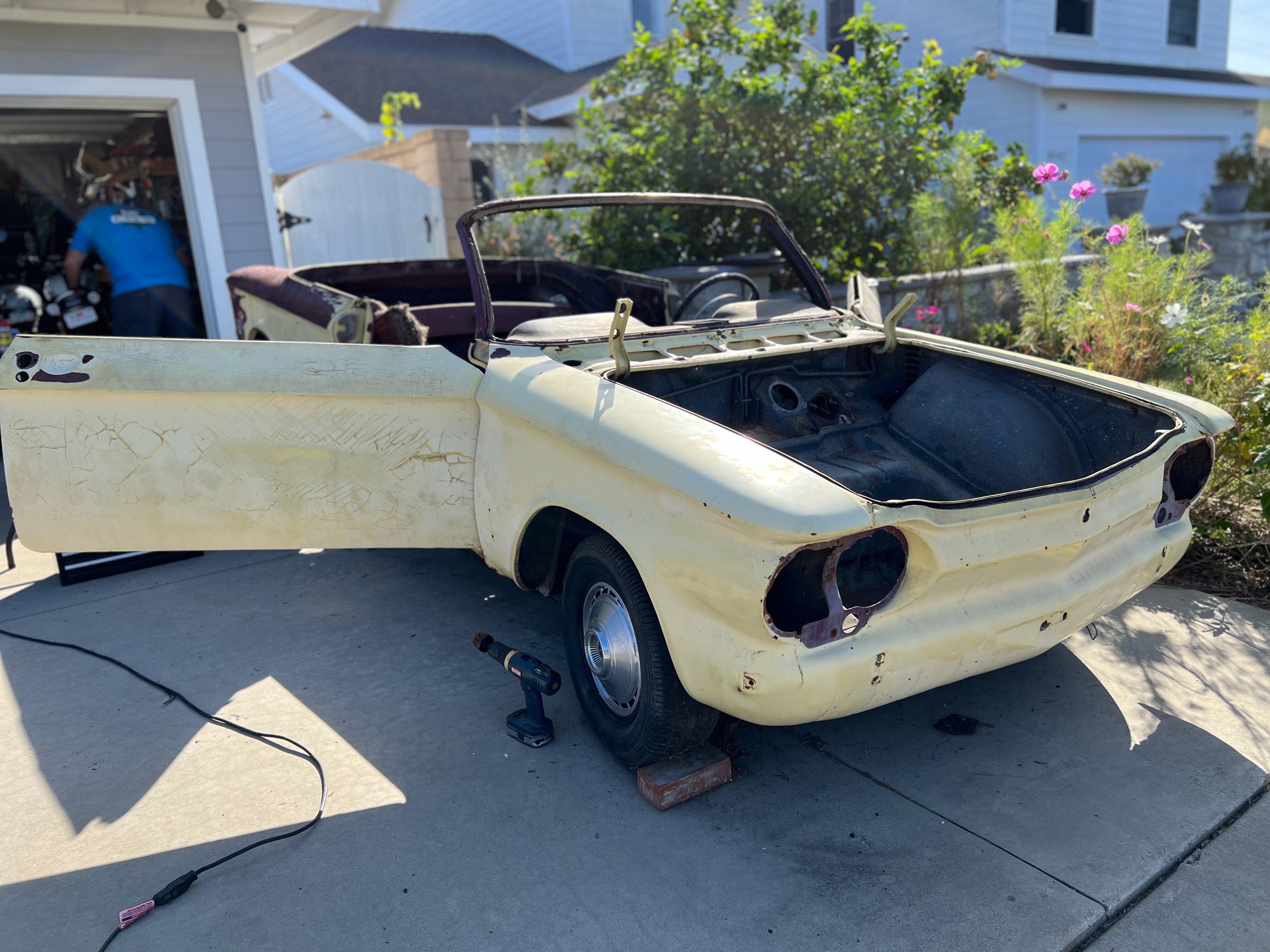 1964 Corvair interior components laid out during disassembly
