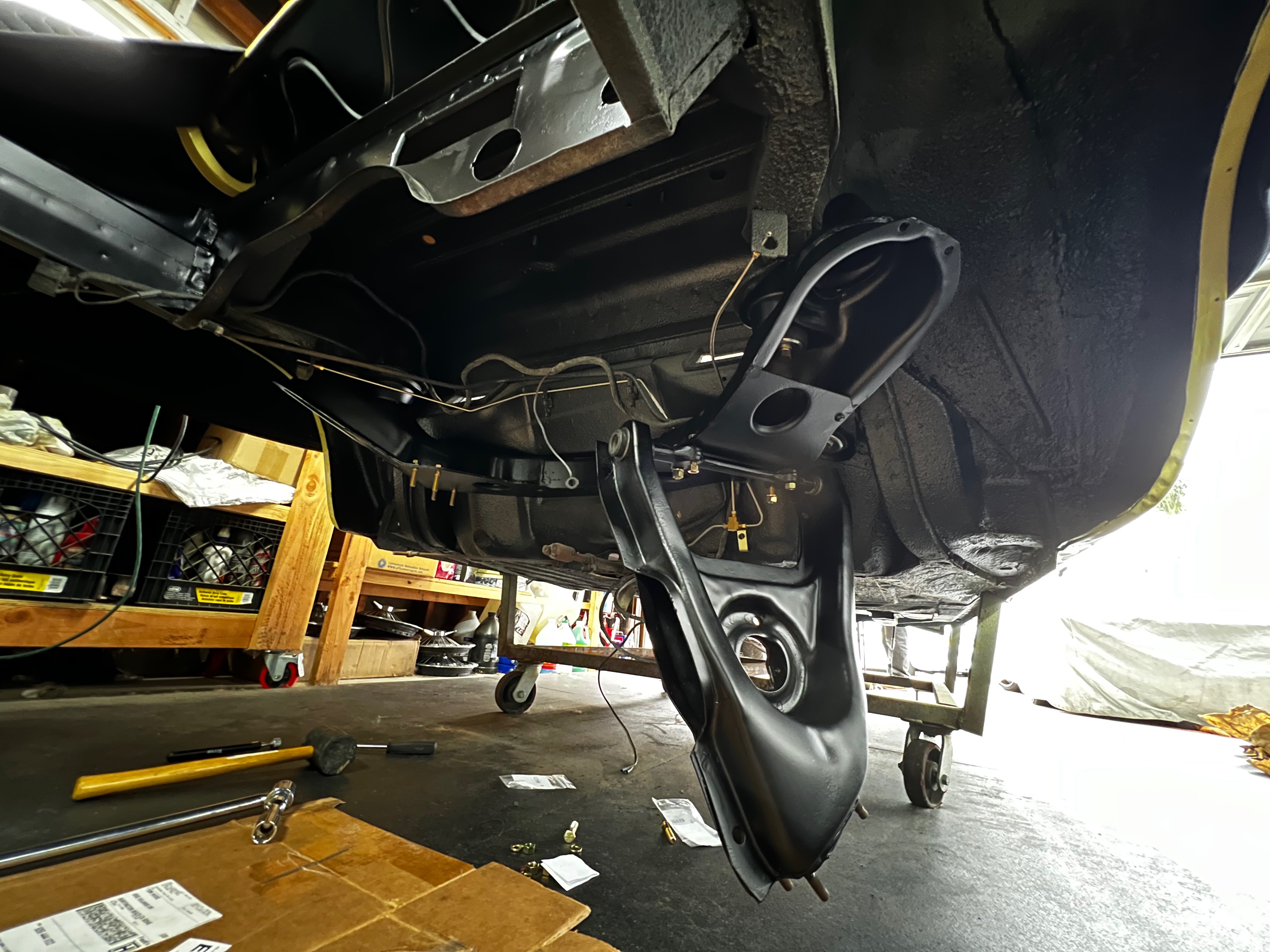 1964 Corvair dashboard installation during reassembly phase