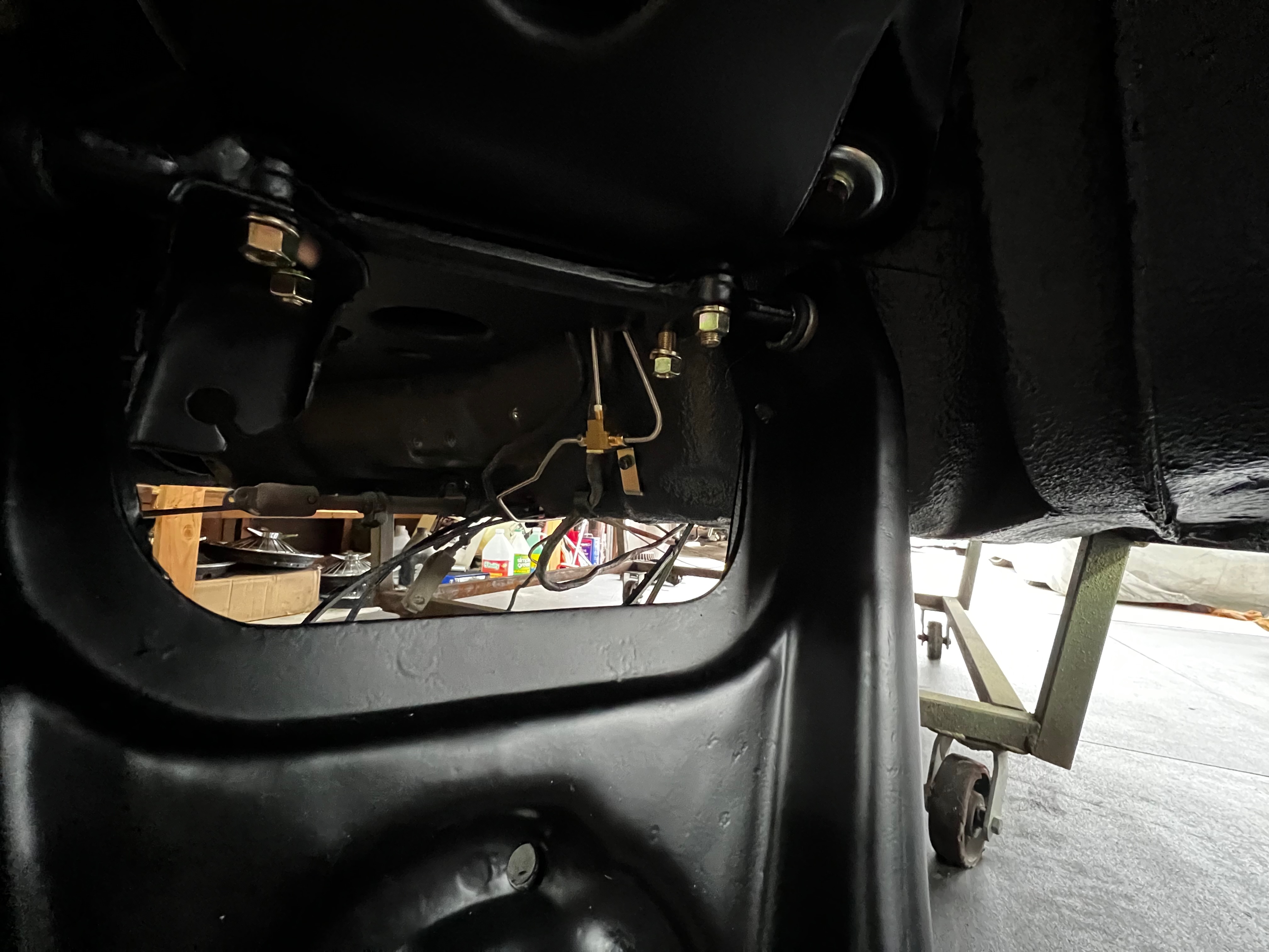 1964 Corvair window glass installation during reassembly phase