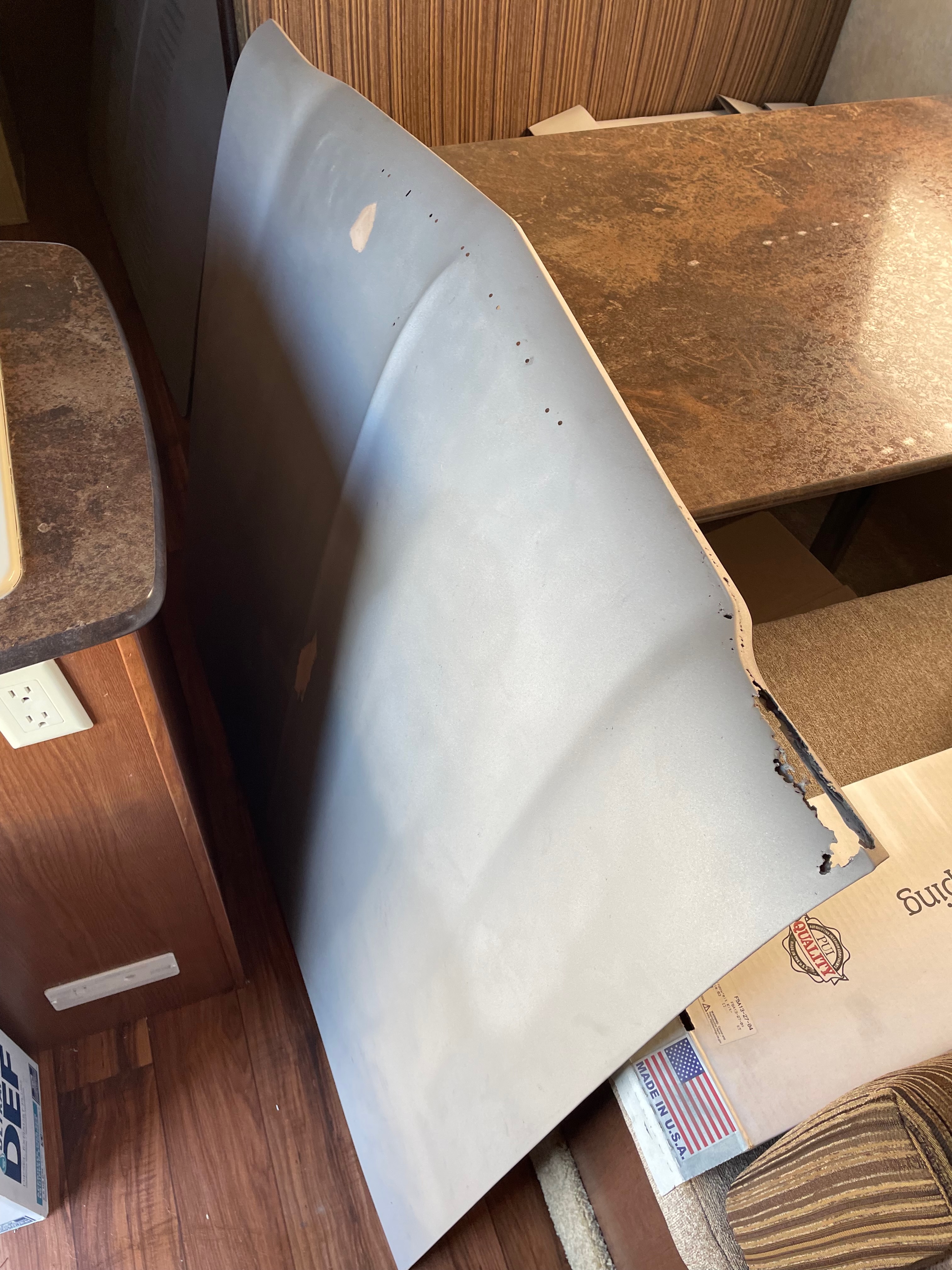 1964 Corvair body panel repair during body-paint phase