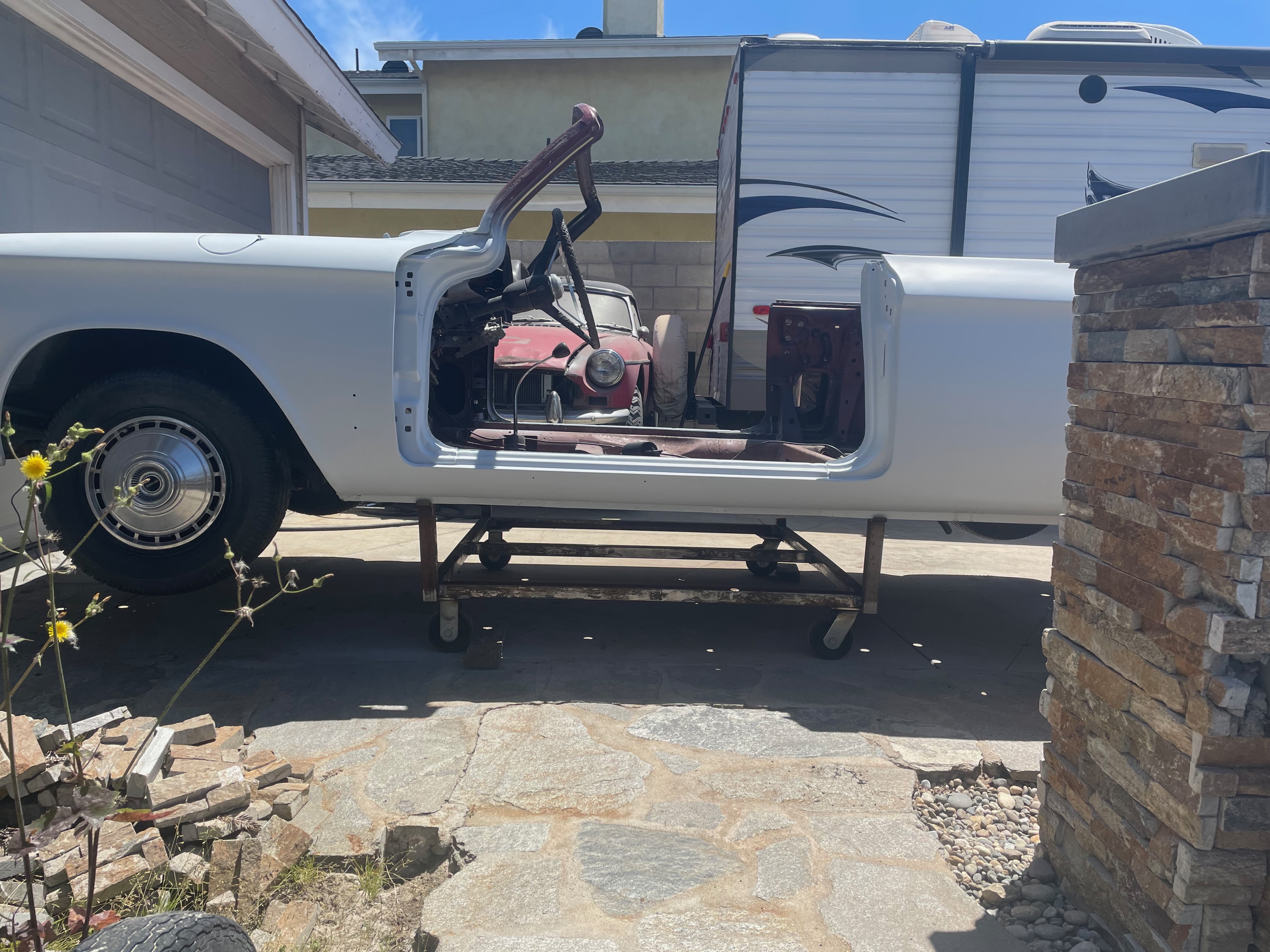 1964 Corvair body panel fabrication during body-paint phase